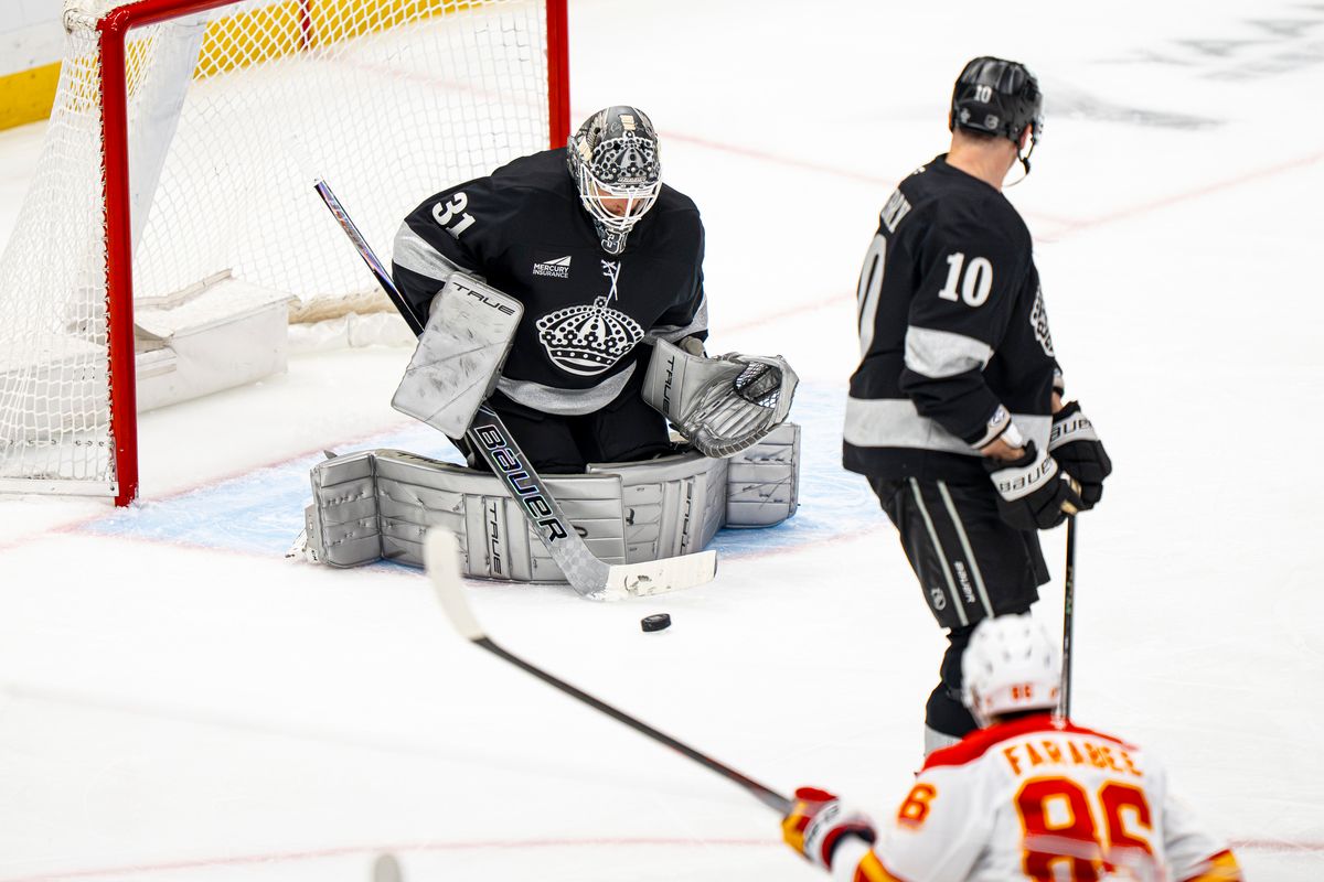 Los Angeles Kings goalie Anton Forsberg (31) successfully blocking a shot on goal during an NHL hockey game against the Calgary Flames on February 26th, 2026 in Los Angeles, CA.