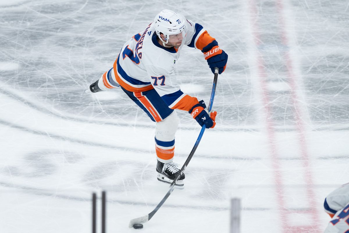 New York Islanders defensiveman Tony DeAngelo (77) makes a pass during an NHL game between the New York Islanders and the Los Angeles Kings on Thursday, March 5, 2026 at Crypto.com Arena in Los Angeles Calif
