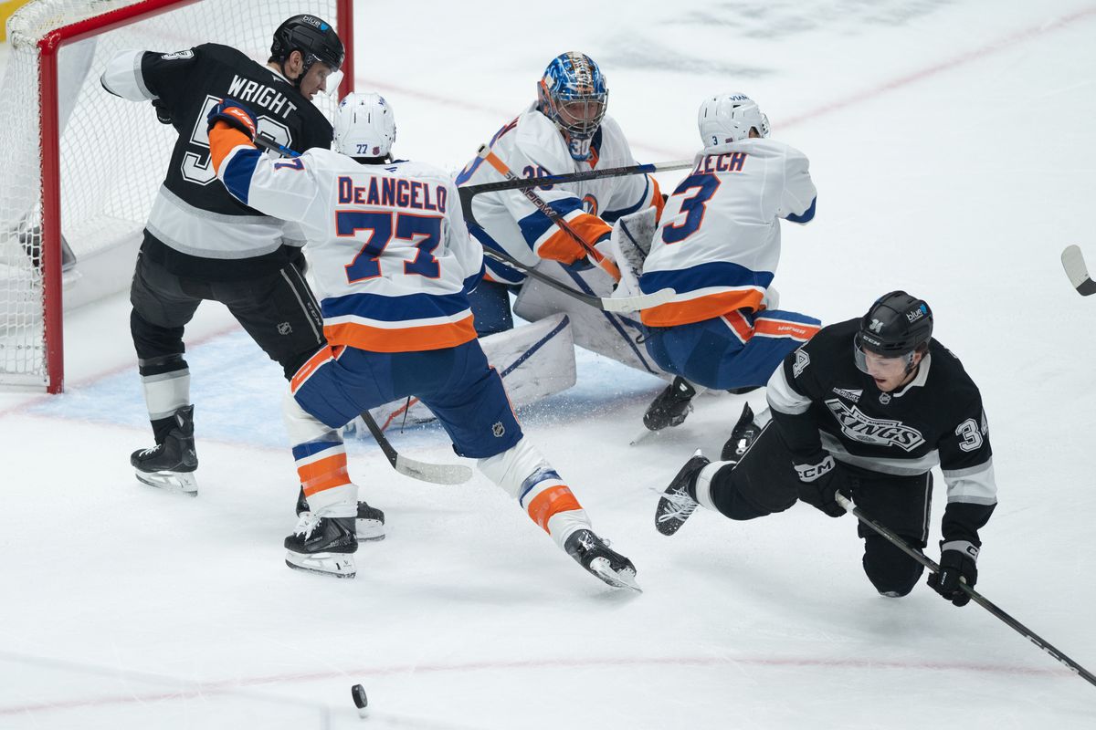 Playes scramble for possession during an NHL game between the New York Islanders and the Los Angeles Kings on Thursday, March 5, 2026 at Crypto.com Arena in Los Angeles Calif