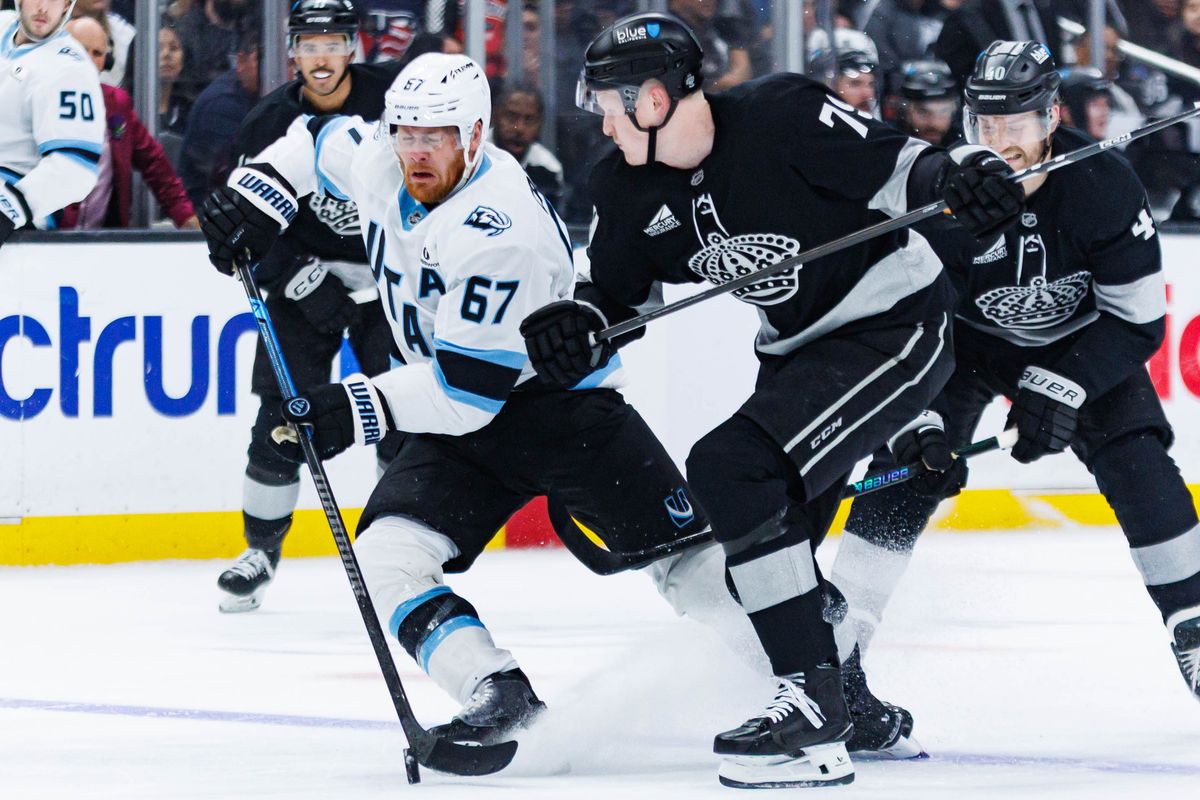 Utah Mammoth left wing Lawson Crouse (#67) closes his eyes as he anticipates a hit during an NHL match against the Los Angeles Kings on March 28, 2026 in Los Angeles, California. Utah Mammoth left wing Lawson Crouse (#67) closes his eyes as he anticipates a hit during an NHL match against the Los Angeles Kings on March 28, 2026 in Los Angeles, California.