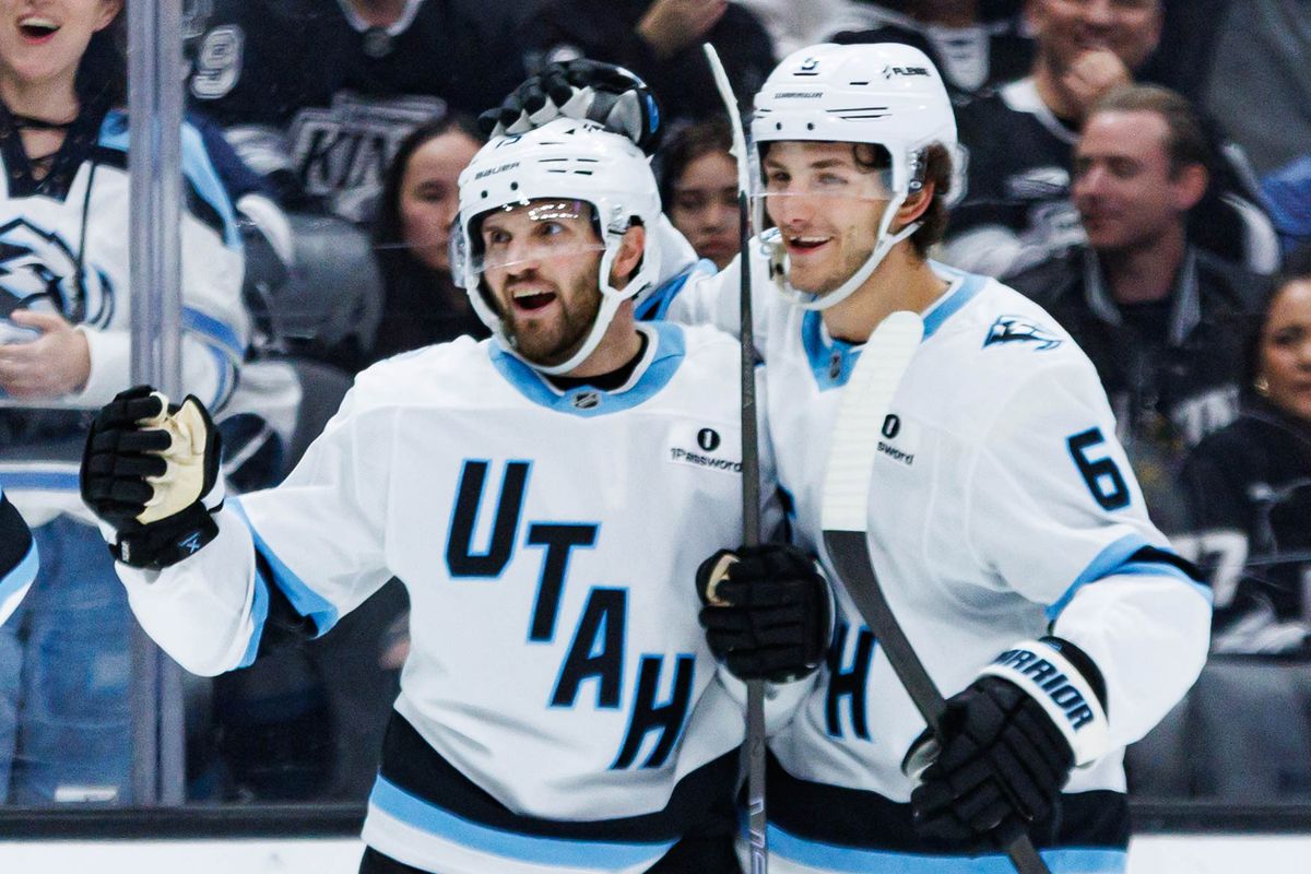 Utah Mammoth center Alexander Kerfoot (#15) celebrates with defenseman John Marino (#6) after scoring a goal during an NHL match against the Los Angeles Kings on March 28, 2026 in Los Angeles, California. Utah Mammoth center Alexander Kerfoot (#15) celebrates with defenseman John Marino (#6) after scoring a goal during an NHL match against the Los Angeles Kings on March 28, 2026 in Los Angeles, California.