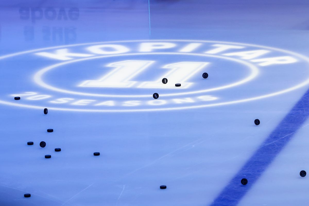 1,308 foam pucks are dropped on the ice to honor Anze Kopitar #11 of the Los Angeles Kings before an NHL hockey game against the Nashville Predators, Thursday April 2, 2026 in Los Angeles, Calif.