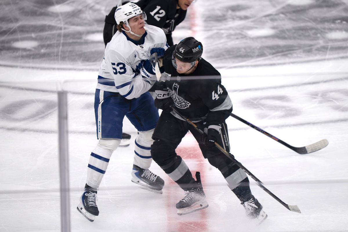 Los Angeles Kings defenseman Mikey Anderson (44) pushes a Maple Leaf opponent during an NHL hockey game against the Toronto Maple Leafs on April 4th, 2026 in Los Angeles, CA. Los Angeles Kings defenseman Mikey Anderson (44) pushes a Maple Leaf opponent during an NHL hockey game against the Toronto Maple Leafs on April 4th, 2026 in Los Angeles, CA.