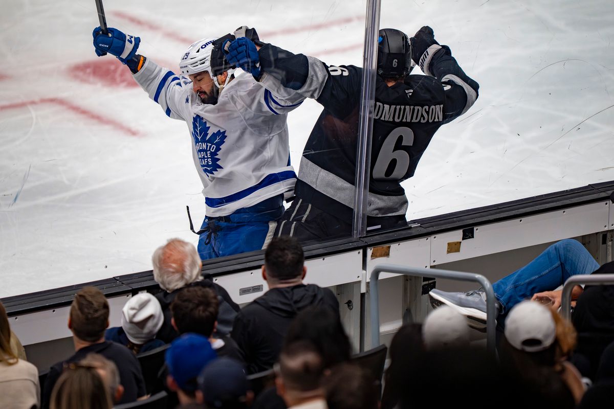 Los Angeles Kings defenseman Joel Edmundson (6) being crushed against the glass during an NHL hockey game against the Toronto Maple Leafs on April 4th, 2026 in Los Angeles, CA. Los Angeles Kings defenseman Joel Edmundson (6) being crushed against the glass during an NHL hockey game against the Toronto Maple Leafs on April 4th, 2026 in Los Angeles, CA.