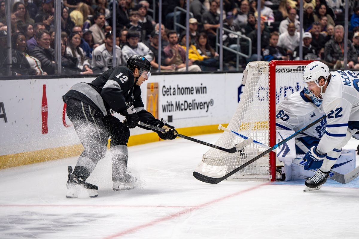 Los Angeles Kings left wing Trevor Moore (12) attempting a goal during an NHL hockey game against the Toronto Maple Leafs on April 4th, 2026 in Los Angeles, CA. Los Angeles Kings left wing Trevor Moore (12) attempting a goal during an NHL hockey game against the Toronto Maple Leafs on April 4th, 2026 in Los Angeles, CA.