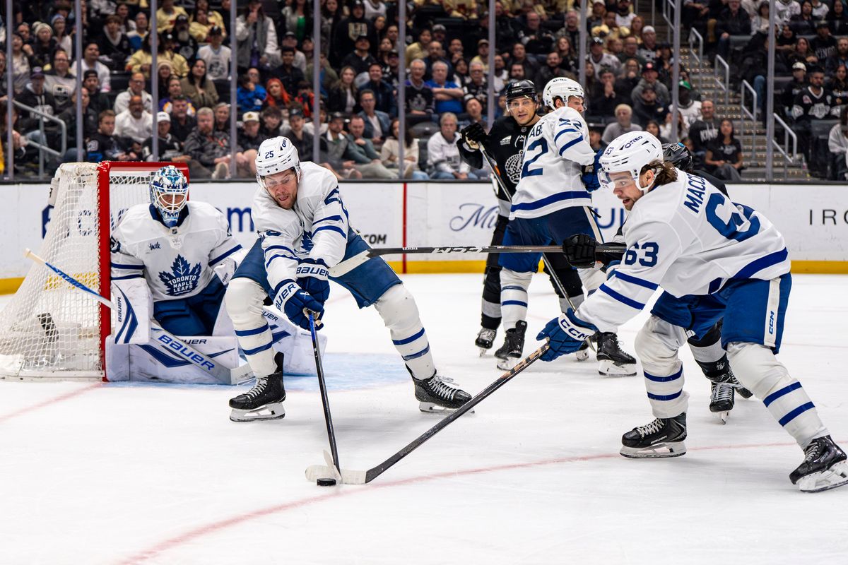 Toronto Maple Leafs defenseman Brandon Carlo (25) retrieving the puck after a block during an NHL hockey game against the Los Angeles Kings on April 4th, 2026 in Los Angeles, CA. Toronto Maple Leafs defenseman Brandon Carlo (25) retrieving the puck after a block during an NHL hockey game against the Los Angeles Kings on April 4th, 2026 in Los Angeles, CA.
