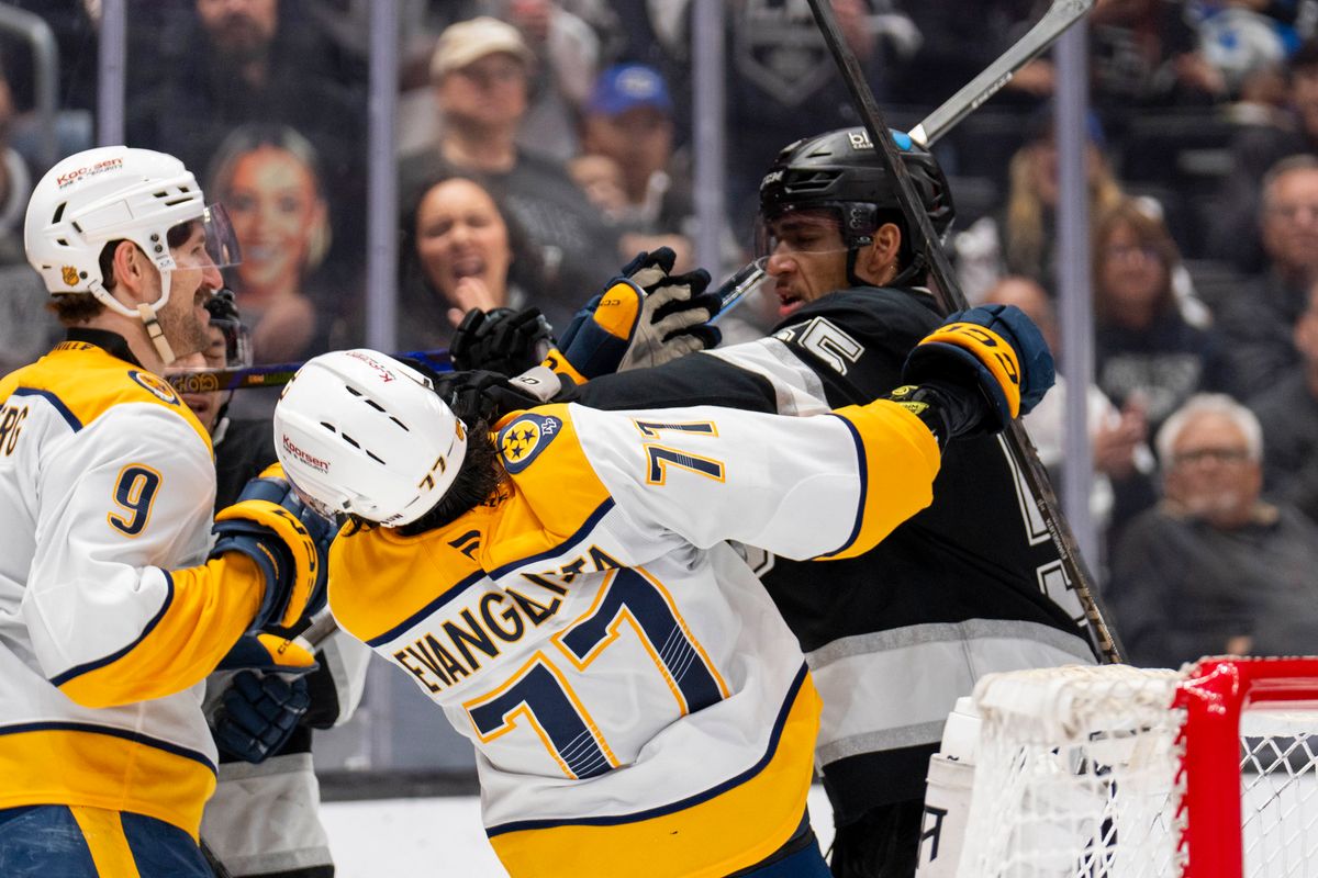 Los Angeles Kings RW Quinton Byfield (55) lands a punch on Luke Evangelista (77) during an NHL game against the Nashville Predators, Monday April 6th, 2026 in Los Angeles, California. 