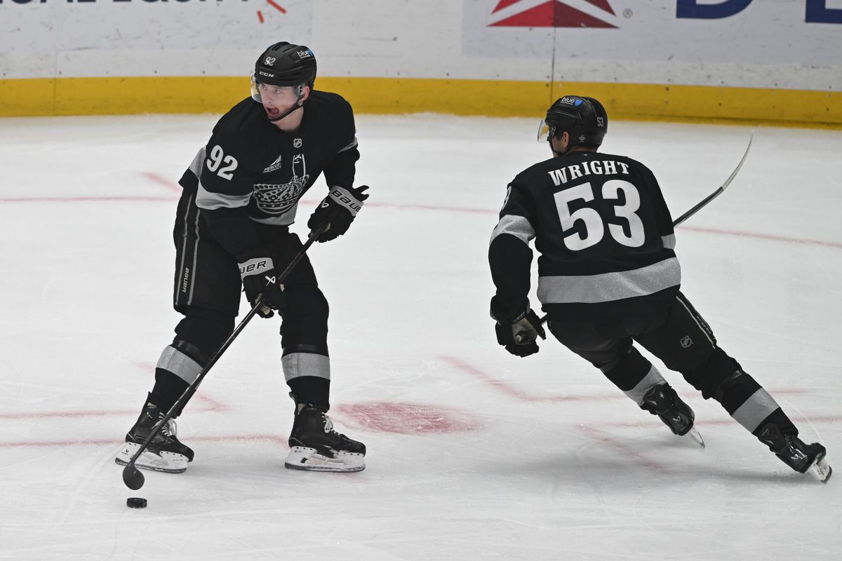 LA Kings defense Brandt Clarke (92) controls the puck during an NHL game between the Edmonton Oilers and the Los Angeles Kings on Saturday, April 11, 2026 at Crypto.com Arena in Los Angeles Calif