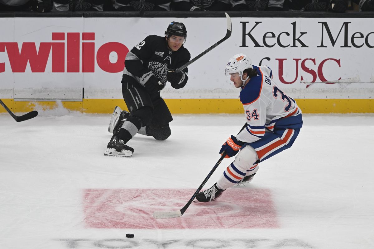 Edmonton Oilers center Colton Dach (34) controls the puck during an NHL game between the Edmonton Oilers and the Los Angeles Kings on Saturday, April 11, 2026 at Crypto.com Arena in Los Angeles Calif