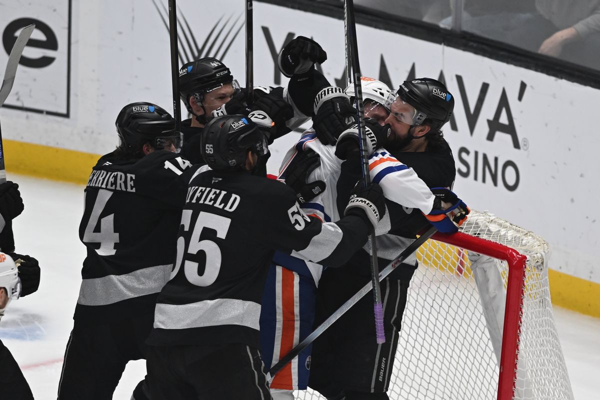 A fight breaks out at the Oilers net during an NHL game between the Edmonton Oilers and the Los Angeles Kings on Saturday, April 11, 2026 at Crypto.com Arena in Los Angeles Calif