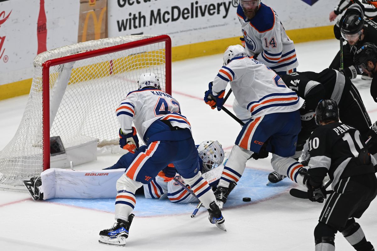 Edmonton Oilers goalie Connor Ingram (39) dives for a save during an NHL game between the Edmonton Oilers and the Los Angeles Kings on Saturday, April 11, 2026 at Crypto.com Arena in Los Angeles Calif