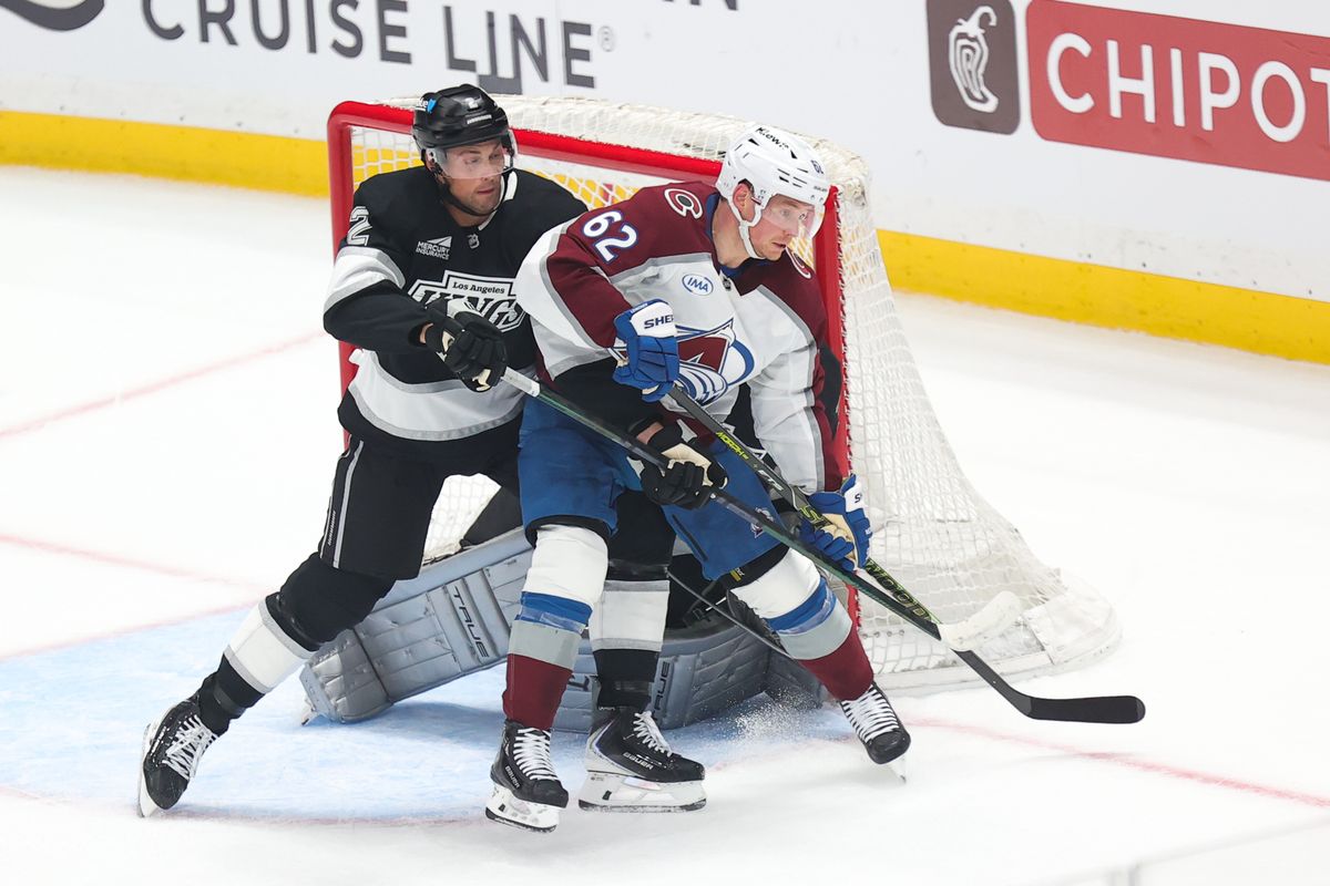 LA Kings defenseman Brian Dumoulin (2) battles for position with Colorado Avalanche left wing Artturi Lehkonen (62) during an NHL game on April 23, 2026 in Los Angeles, CA.