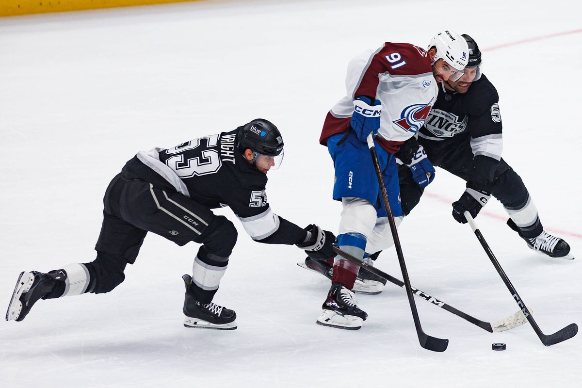 Nazem Kadri #91 of the Colorado Avalanche attempts to defend the puck during an NHL Playoffs game against the Los Angeles Kings on April 26, 2026 at Crypto.com Arena in Los Angeles, California.