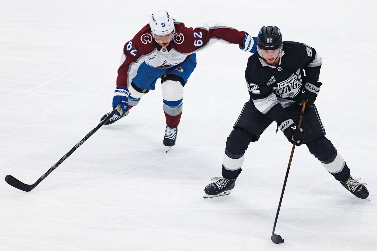 Brandt Clarke #92 of the Los Angeles Kings defends puck during an NHL Playoffs game against the Colorado Avalanche on April 26, 2026 at Crypto.com Arena in Los Angeles, California.
