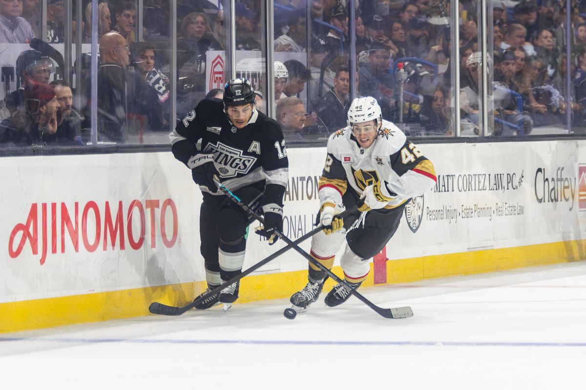 LA Kings left wing Trevor Moore (12) battles for the puck against the Vegas Golden Knights at Toyota Arena, Saturday, Sept. 19, 2026, in Ontario, California. LA Kings left wing Trevor Moore (12) battles for the puck against the Vegas Golden Knights at Toyota Arena, Saturday, Sept. 19, 2026, in Ontario, California.