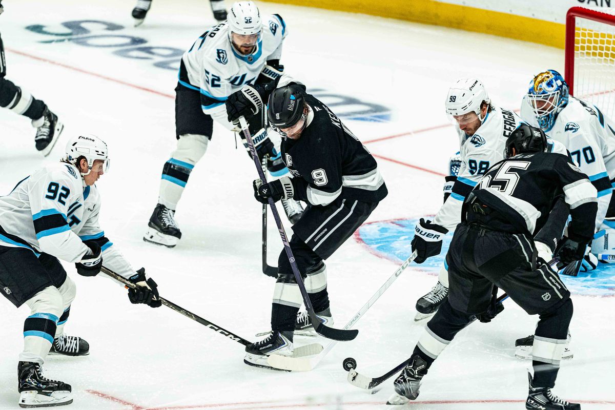 Los Angeles Kings RW Adrian Kempe (9) fights off the defense during an NHL match against the Utah Mammoth on September 22nd, 2026 in Los Angeles, California. Los Angeles Kings RW Adrian Kempe (9) fights off the defense during an NHL match against the Utah Mammoth on September 22nd, 2026 in Los Angeles, California.