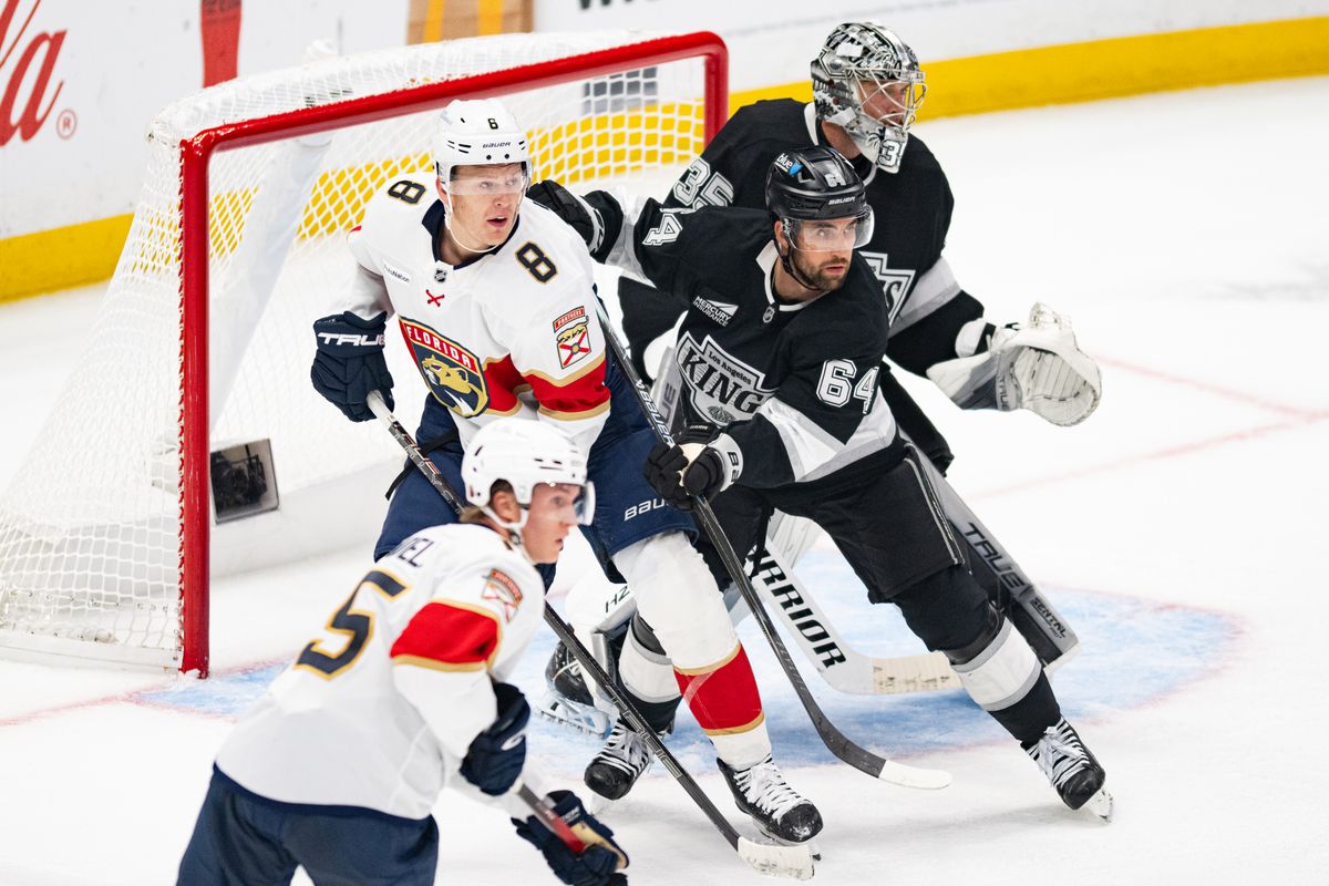 Los Angeles Kings defensiveman Erik Gustafsson (64) boxes out Florida Panthers left wing Brady Tkachuk (8) during an NHL hockey game against the Florida Panthers, Tuesday, October 6, 2026 in Los Angeles. Los Angeles Kings defensiveman Erik Gustafsson (64) boxes out Florida Panthers left wing Brady Tkachuk (8) during an NHL hockey game against the Florida Panthers, Tuesday, October 6, 2026 in Los Angeles.