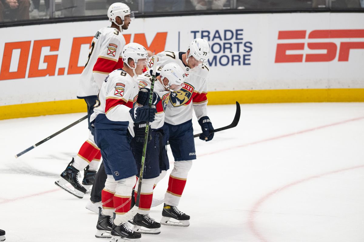 Teammates help Florida Panthers left wing Brad Marchand (63) off the rink after suffering an injury during an NHL hockey game against the Los Angeles Kings, Tuesday, October 6, 2026 in Los Angeles. Teammates help Florida Panthers left wing Brad Marchand (63) off the rink after suffering an injury during an NHL hockey game against the Los Angeles Kings, Tuesday, October 6, 2026 in Los Angeles.