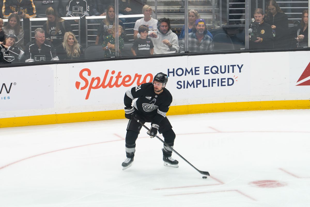 Los Angeles Kings center Scott Laughton (21) looks for a passing lane during an NHL game against the Boston Bruins, Saturday, Oct. 17, 2026, at Crypto.com Arena in Los Angeles, California. Los Angeles Kings center Scott Laughton (21) looks for a passing lane during an NHL game against the Boston Bruins, Saturday, Oct. 17, 2026, at Crypto.com Arena in Los Angeles, California.