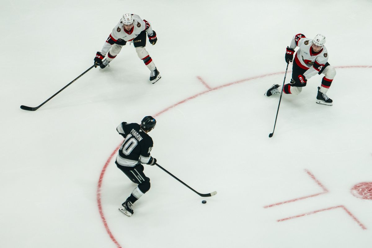 Writing      Los Angeles Kings left wing Artemi Panarin (10) maneuvers through Ottawa Senators defenders during a game on October 29, 2026, at Crypto.com Arena in Los Angeles, California.