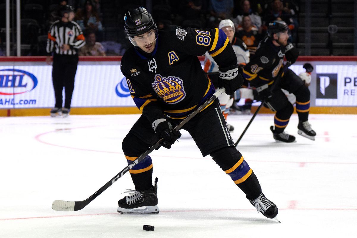Reign forward Cole Guttman (81) controls the puck during an AHL hockey game against the Gulls, Wednesday October 14, 2026 in San Diego, California.