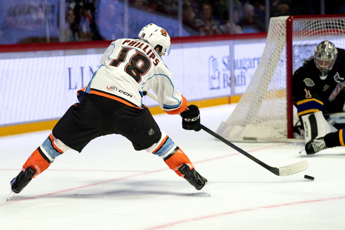 Gulls forward Matthew Phillips (18) shoots the puck during an AHL hockey game against the Reign, Wednesday October 14, 2026 in San Diego, California.