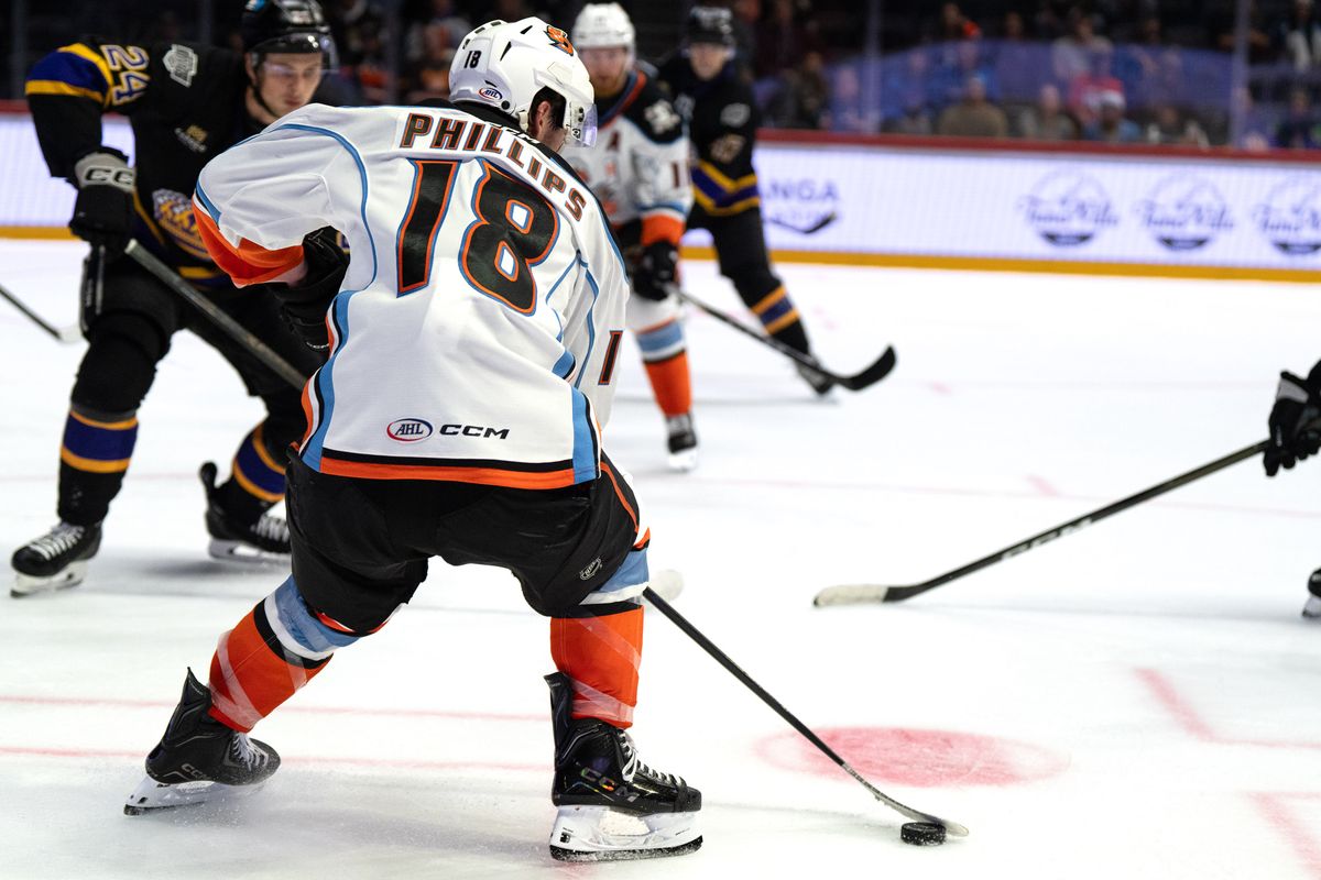 Gulls forward Matthew Phillips (18) controls the puck during an AHL hockey game against the Reign, Wednesday October 14, 2026 in San Diego, California.