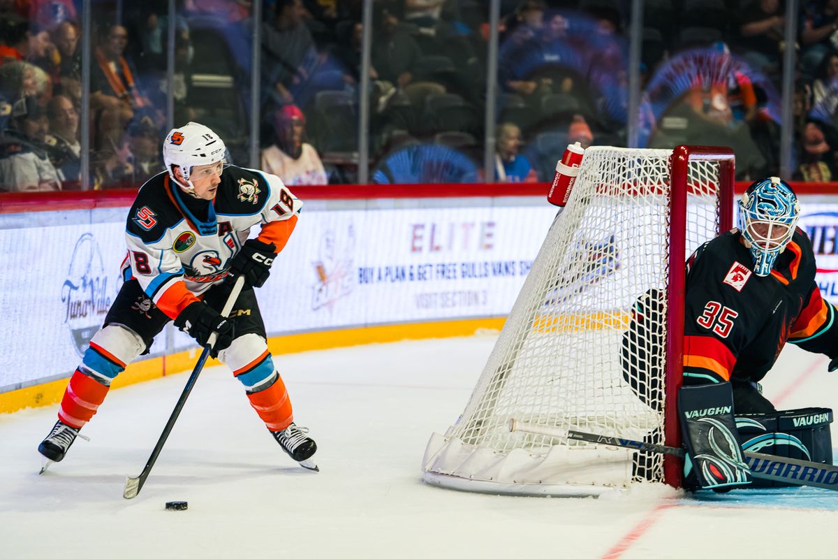 The San Diego Gulls forward Matthew Phillips (18) goes around the net during an AHL hockey game against the Coachella Valley Firebirds on Wednesday, October 21, 2026, at Pechanga Arena in San Diego, California. The San Diego Gulls forward Matthew Phillips (18) goes around the net during an AHL hockey game against the Coachella Valley Firebirds on Wednesday, October 21, 2026, at Pechanga Arena in San Diego, California.