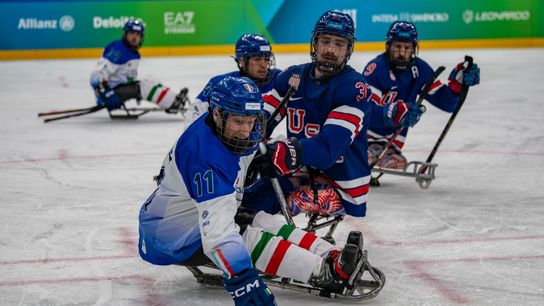 Team USA in action against Team Italy during the Preliminary Round of Para Ice Hockey between the USA and Italy on day one of the Milano Cortina 2026 Winter Paralympics at the Milano Santagiulia Ice Hockey Arena on March 07, 2026, in Milan, Italy.