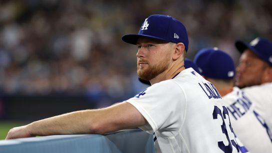 Jul 29, 2026; Los Angeles, California, USA; Los Angeles Dodgers pitcher Eric Lauer (33) watches a game from the dugout during the seventh inning against the Seattle Mariners at Dodger Stadium. Jul 29, 2026; Los Angeles, California, USA; Los Angeles Dodgers pitcher Eric Lauer (33) watches a game from the dugout during the seventh inning against the Seattle Mariners at Dodger Stadium.