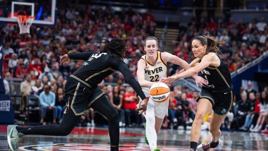 Aug 11, 2026; Indianapolis, Indiana, USA; Indiana Fever guard Caitlin Clark (22) dribbles the ball while New York Liberty guard Rebecca Allen (9) and center Jonquel Jones (35) defend in the second half at Gainbridge Fieldhouse. Aug 11, 2026; Indianapolis, Indiana, USA; Indiana Fever guard Caitlin Clark (22) dribbles the ball while New York Liberty guard Rebecca Allen (9) and center Jonquel Jones (35) defend in the second half at Gainbridge Fieldhouse.