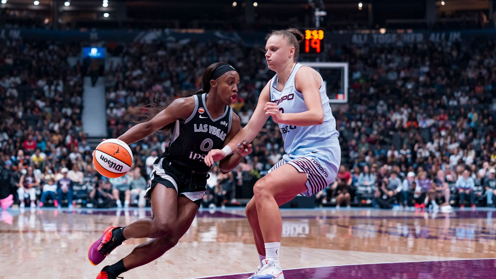 Aug 23, 2026; Vancouver, British Columbia, CAN; Las Vegas Aces guard Jackie Young (0) drives past Toronto Tempo forward Laura Juskaite (2) in the second half at Rogers Arena. Aug 23, 2026; Vancouver, British Columbia, CAN; Las Vegas Aces guard Jackie Young (0) drives past Toronto Tempo forward Laura Juskaite (2) in the second half at Rogers Arena.