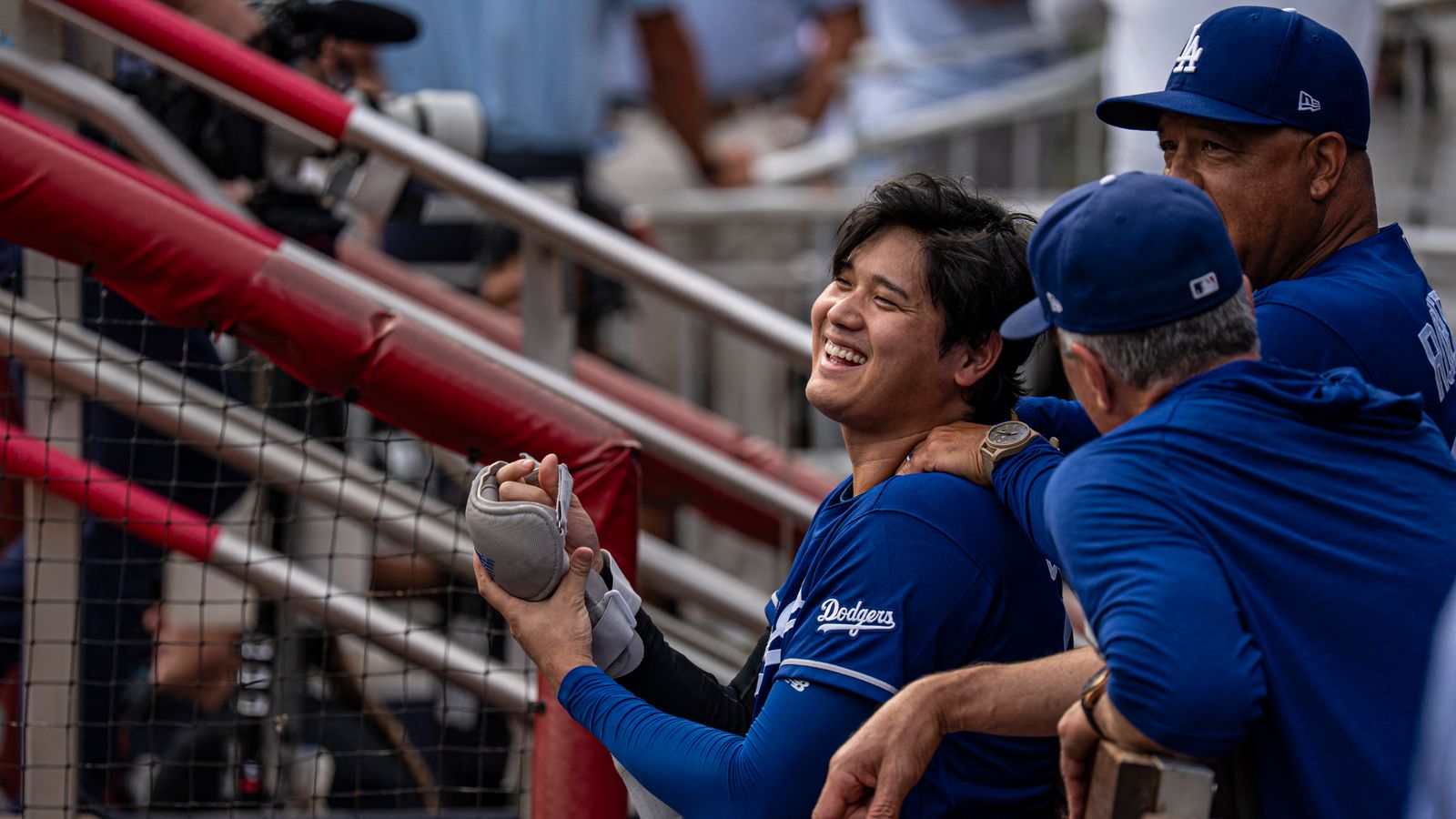 Aug 27, 2026; Cumberland, Georgia, USA; Los Angeles Dodgers designated hitter Shohei Ohtani (17) reacts with manager Dave Roberts (30) before the game against the Atlanta Braves at Truist Park. 
