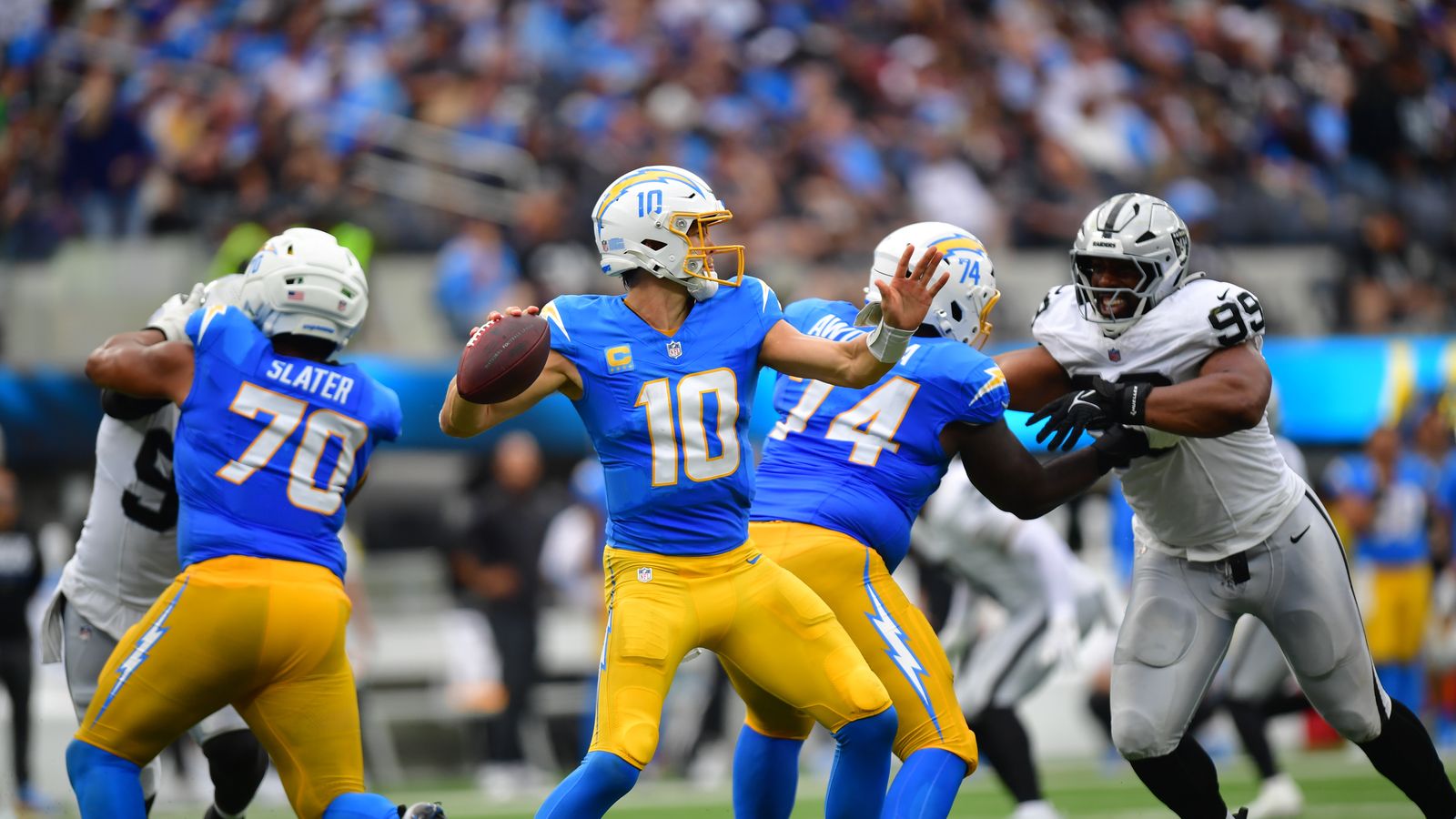 Sep 20, 2026; Inglewood, California, USA; Los Angeles Chargers quarterback Justin Herbert (10) throws a pass against the Las Vegas Raiders during the first half at SoFi Stadium.