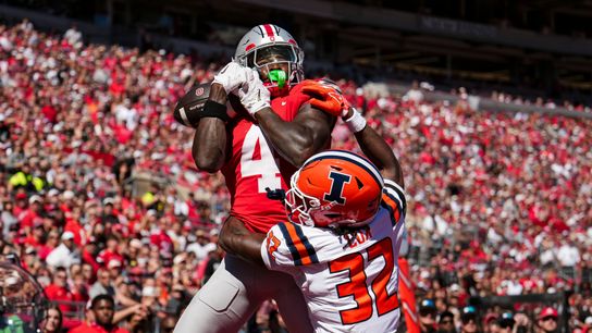 Ohio State Buckeyes wide receiver Jeremiah Smith (4) catches a touchdown over Illinois Fighting Illini defensive back Tywan Cox (32) during the NCAA football game at Ohio Stadium in Columbus on Sept. 26, 2026. Ohio State Buckeyes wide receiver Jeremiah Smith (4) catches a touchdown over Illinois Fighting Illini defensive back Tywan Cox (32) during the NCAA football game at Ohio Stadium in Columbus on Sept. 26, 2026.