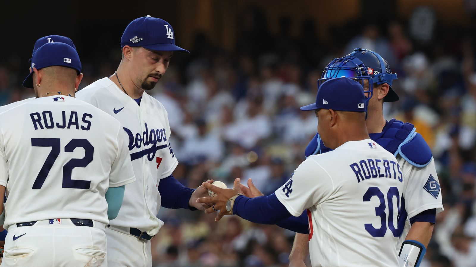 Oct 4, 2026; Los Angeles, California, USA; Los Angeles Dodgers pitcher Blake Snell (7) is relieved by manager Dave Roberts during the fourth inning against the Atlanta Braves in game two of the NLDS for the 2026 MLB Playoffs at Uniqlo Field at Dodger Stadium.