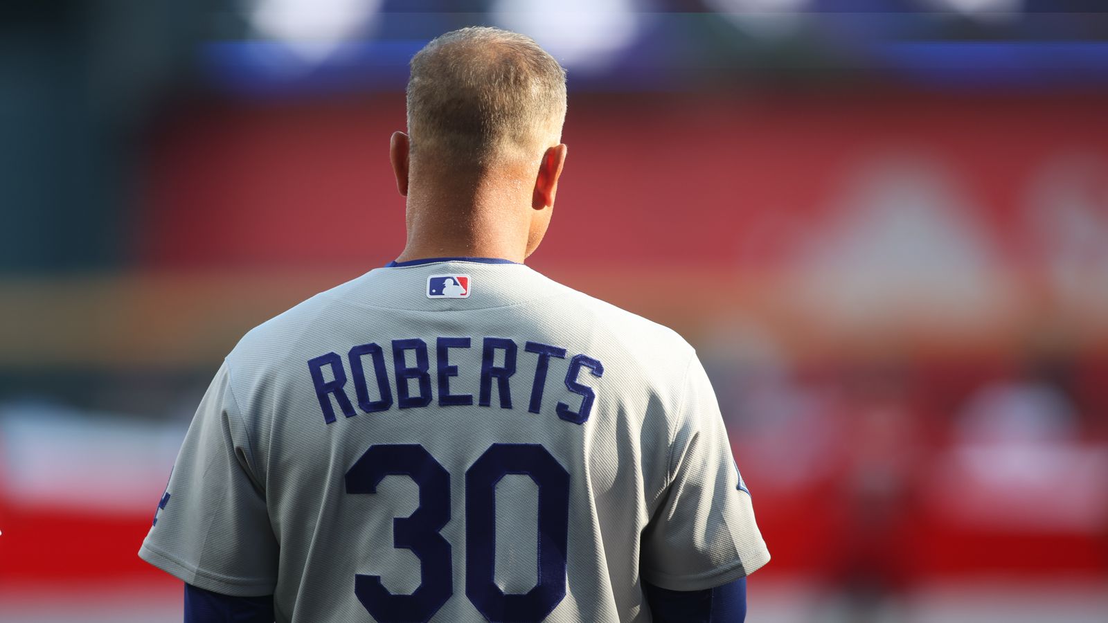 Oct 6, 2026; Cumberland, Georgia, USA; Los Angeles Dodgers manager Dave Roberts stands during national anthem prior to a game against Atlanta Braves in game three of the NLDS for the 2026 MLB Playoffs at Truist Park Oct 6, 2026; Cumberland, Georgia, USA; Los Angeles Dodgers manager Dave Roberts stands during national anthem prior to a game against Atlanta Braves in game three of the NLDS for the 2026 MLB Playoffs at Truist Park