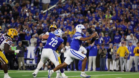 Oct 10, 2026; Lexington, Kentucky, USA; Kentucky Wildcats quarterback Kenny Minchey (3) runs the ball in for a two point conversion to win the game in overtime against the LSU Tigers at Kroger Field. Oct 10, 2026; Lexington, Kentucky, USA; Kentucky Wildcats quarterback Kenny Minchey (3) runs the ball in for a two point conversion to win the game in overtime against the LSU Tigers at Kroger Field.