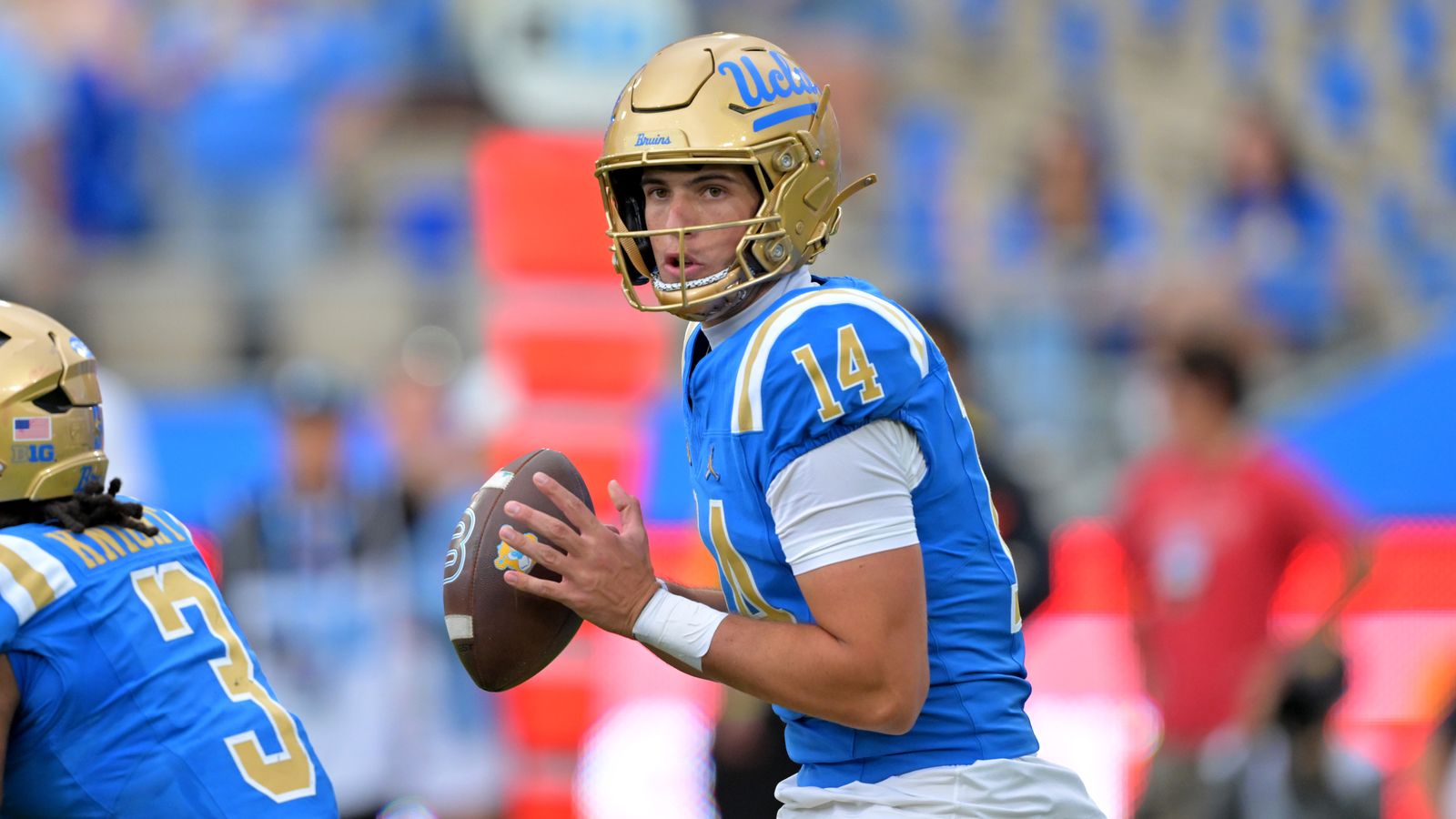 Oct 17, 2026; Pasadena, California, USA; UCLA Bruins quarterback Ty Dieffenbach (14) passes in the first half against the Wisconsin Badgers at the Rose Bowl. Oct 17, 2026; Pasadena, California, USA; UCLA Bruins quarterback Ty Dieffenbach (14) passes in the first half against the Wisconsin Badgers at the Rose Bowl.