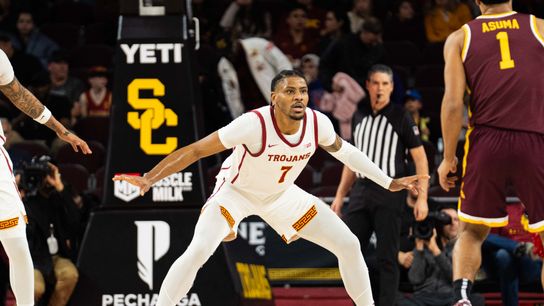 USC guard Chibuzo Agbo (7) gets in a defensive stance in a game against the Minnesota Gophers, Saturday February 15, 2025 in Los Angeles, Calif.