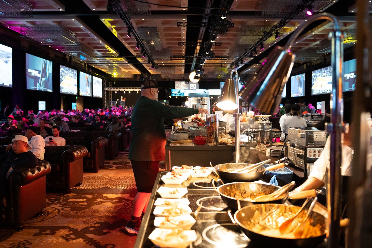 Fans watching college basketball and picking up foodat the Hoops & Hops event at the Cosmopolitan Resort & Casino on Friday March 22, 2025 in Las Vegas. Fans watching college basketball and picking up foodat the Hoops & Hops event at the Cosmopolitan Resort & Casino on Friday March 22, 2025 in Las Vegas.