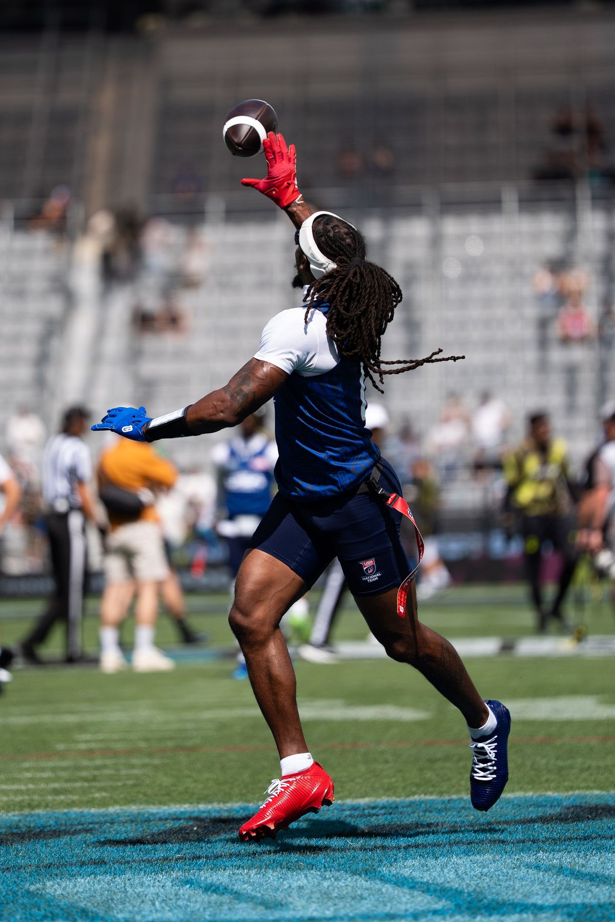 A Team USA player makes a one-handed catch during warmups ahead of the Fanatics Flag Football event, March 21, 2026, in Los Angeles. A Team USA player makes a one-handed catch during warmups ahead of the Fanatics Flag Football event, March 21, 2026, in Los Angeles.
