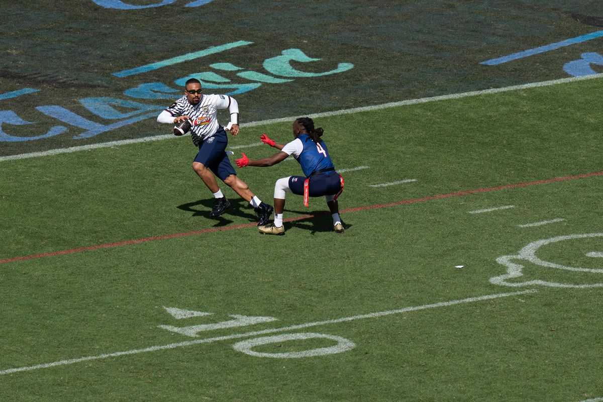Team Founders quarterback Jalen Hurts (1) scrambles past a defender during the Fanatics Flag Football event, March 21, 2026, in Los Angeles. Team Founders quarterback Jalen Hurts (1) scrambles past a defender during the Fanatics Flag Football event, March 21, 2026, in Los Angeles.