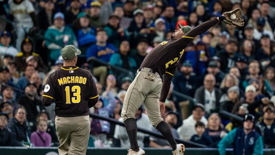 May 15, 2026; Seattle, Washington, USA; Seattle Mariners shortstop Xander Bogaerts (2) makes a catch in fould territory during the third inning against the Seattle Mariners at T-Mobile Park. Mandatory Credit: Stephen Brashear-Imagn Images