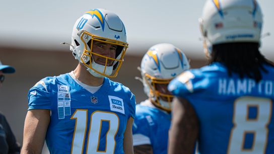 Los Angeles Chargers quarterback Justin Herbert (10) greeting running back Omarion Hampton (8) during Chargers training camp at the Bolt on Wednesday, July 29th in El Segundo, CA. Los Angeles Chargers quarterback Justin Herbert (10) greeting running back Omarion Hampton (8) during Chargers training camp at the Bolt on Wednesday, July 29th in El Segundo, CA.