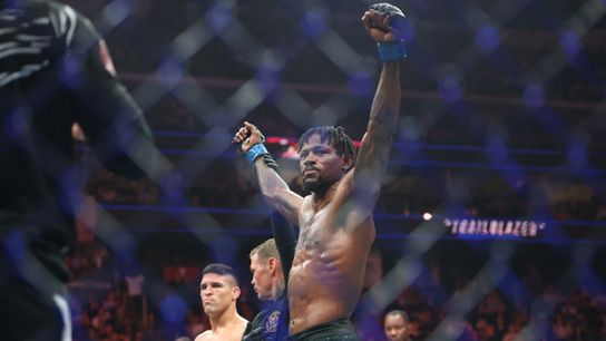 Jun 7, 2025; Newark, New Jersey, UNITED STATES; Kevin Holland (blue gloves) reacts after defeating Vicente Luque (red gloves) during UFC 316 at Prudential Center.