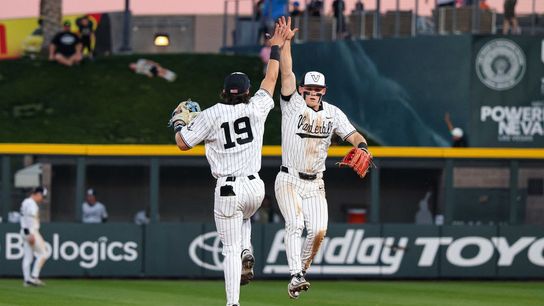 Vanderbilt Commodores LF Rustan Rigdon (19) and Vanderbilt Commodores SS Ryker Waite (51) high five prior to the start of an inning against the Arizona Wildcats at the 2026 Live Like Lou Las Vegas College Baseball Classic on Saturday, February 28, 2026, at Las Vegas Ballpark in Las Vegas, Nevada.