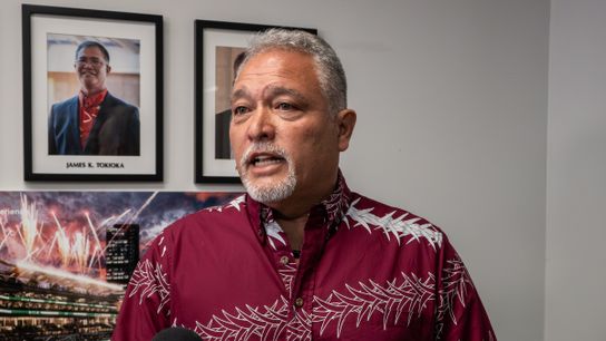 Brennon Morioka addresses the media following the stadium authority board special session.