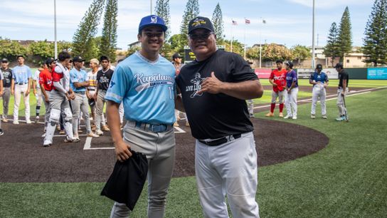 Nevada-bound Greyson Osbun poses for a photo with coach Nathan 