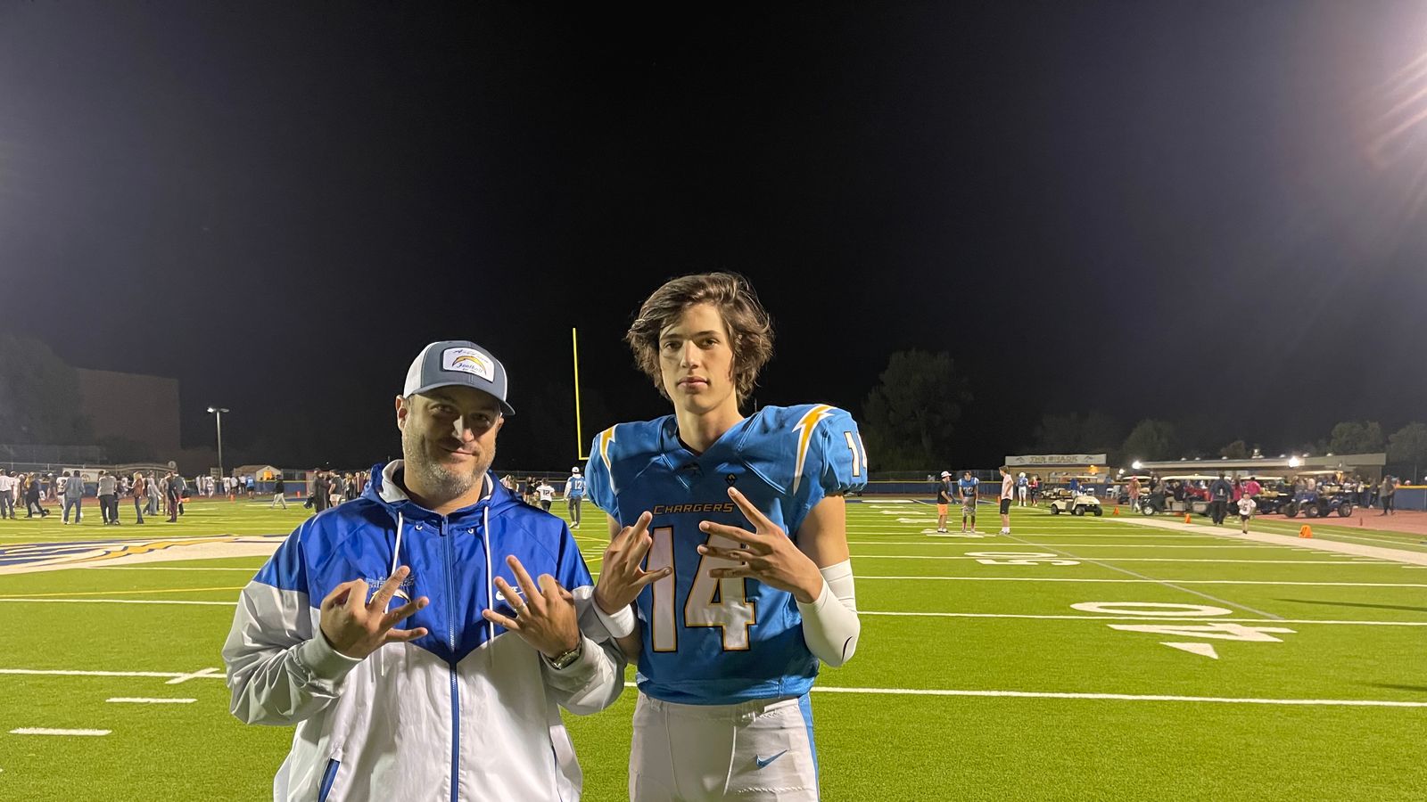 Coach Croick standing next to Ty Dieffeenbach after breaking the school's All time passing TD record Coach Croick standing next to Ty Dieffeenbach after breaking the school's All time passing TD record